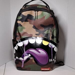 Sprayground Shark Tongue Remix Camouflage Backpack with Purple Accent